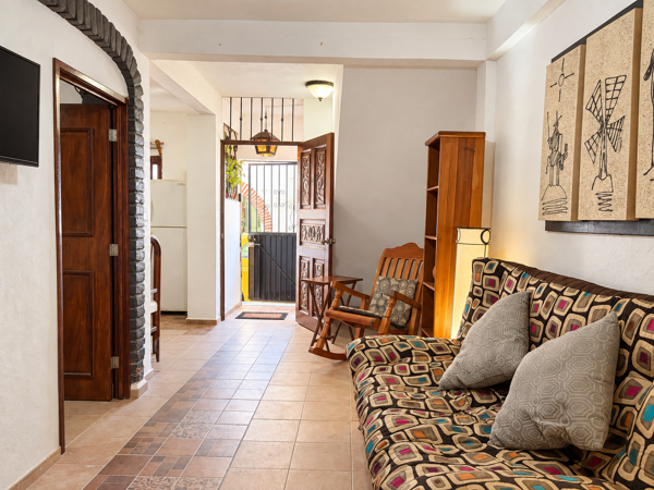 Bright entry lounge with cozy seating and charming local character