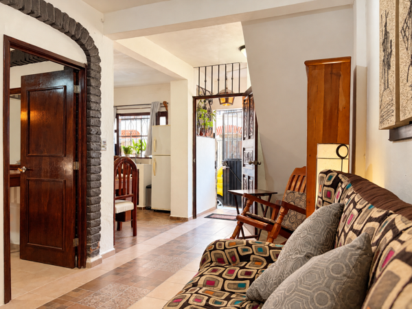Warm living area with open layout and charming rustic details