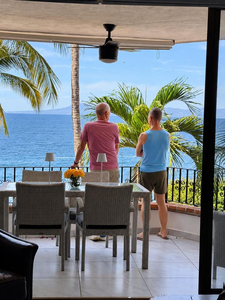 Property owners enjoying an oceanfront terrace in Puerto Vallarta