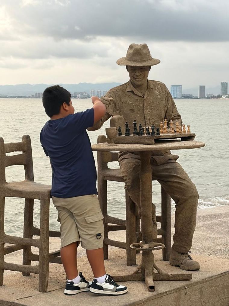 Puerto Vallarta waterfront sculpture and chess scene by the bay