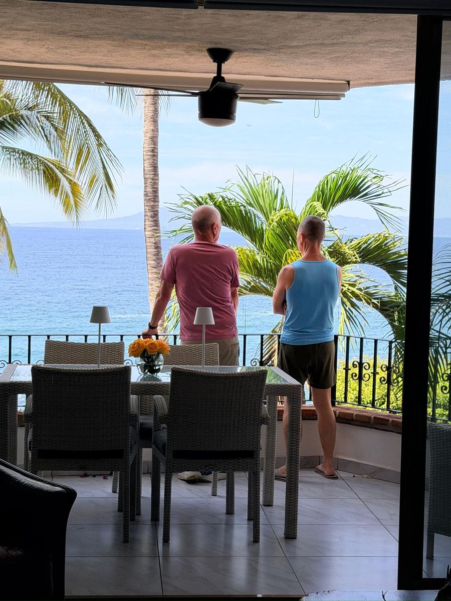 Property owners enjoying an oceanfront terrace in Puerto Vallarta
